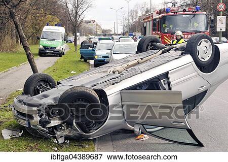 Traffic accident, car rollover, Munich, Upper Bavaria, Bavaria, Germany, Europe View Large Photo Image Stock Photo - Traffic accident, car rollover, Munich, Upper Bavaria, Bavaria, Germany, Europe. Fotosearch