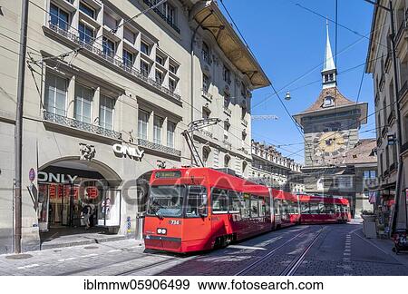 Stock Photo - Tram driving in Bern old town, behind clock tower Zytglogge, inner city, Bern, canton Bern, Switzerland, Europe. Fotosearch