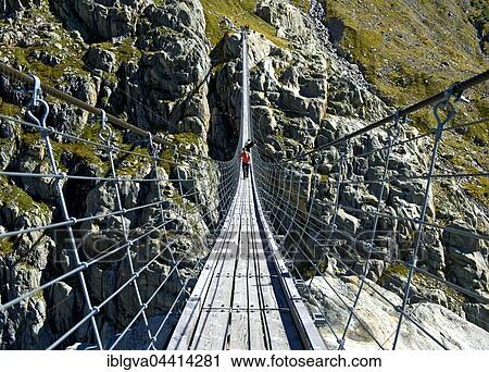 Trift Bridge, longest pedestrian-only suspension bridge in Swiss Alps, Trift Gorge, Gadmer Valley, Gadmen, Bern Canton, Switzerland, Europe View Large Photo Image Stock Image - Trift Bridge, longest pedestrian-only suspension bridge in Swiss Alps, Trift Gorge, Gadmer Valley, Gadmen, Bern Canton, Switzerland, Europe. Fotosearch