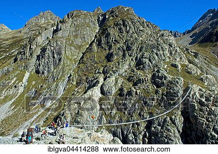 Trift Bridge, longest pedestrian-only suspension bridge in Swiss Alps, Trift Gorge, Gadmer Valley, Gadmen, Bern Canton, Switzerland, Europe View Large Photo Image Stock Photo - Trift Bridge, longest pedestrian-only suspension bridge in Swiss Alps, Trift Gorge, Gadmer Valley, Gadmen, Bern Canton, Switzerland, Europe. Fotosearch