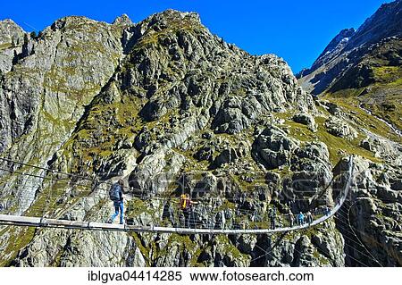 Trift Bridge, longest pedestrian-only suspension bridge in Swiss Alps, Trift Gorge, Gadmer Valley, Gadmen, Bern Canton, Switzerland, Europe View Large Photo Image Stock Photography - Trift Bridge, longest pedestrian-only suspension bridge in Swiss Alps, Trift Gorge, Gadmer Valley, Gadmen, Bern Canton, Switzerland, Europe. Fotosearch