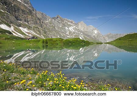 Stock Image - Trüebsee with view of Huetstock and Rotsandnollen, Nidwalden, Switzerland, Europe. Fotosearch