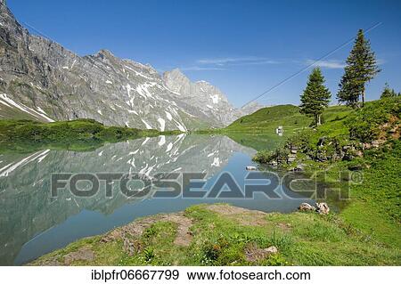 Trüebsee with view of Huetstock and Rotsandnollen, Nidwalden, Switzerland, Europe View Large Photo Image Stock Photo - Trüebsee with view of Huetstock and Rotsandnollen, Nidwalden, Switzerland, Europe. Fotosearch