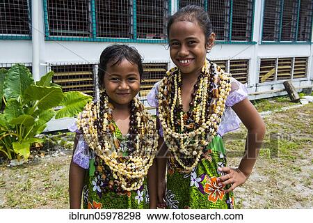 Two Girls with necklaces made of shells, Funafuti, Tuvalu, Oceania View Large Photo Image Stock Photo - Two Girls with necklaces made of shells, Funafuti, Tuvalu, Oceania. Fotosearch