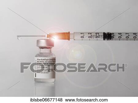 Vaccine vial against Covid 19 and syringe with drops, Biontech, Pfizer, Pfizer-BioNTech View Large Photo Image Stock Photo - Vaccine vial against Covid 19 and syringe with drops, Biontech, Pfizer, Pfizer-BioNTech. Fotosearch