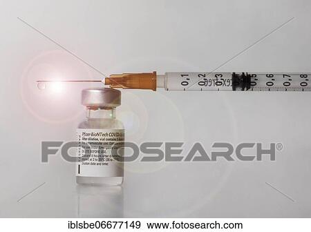 Vaccine vial against Covid 19 and syringe with drops, Biontech, Pfizer, Pfizer-BioNTech View Large Photo Image Stock Photo - Vaccine vial against Covid 19 and syringe with drops, Biontech, Pfizer, Pfizer-BioNTech. Fotosearch
