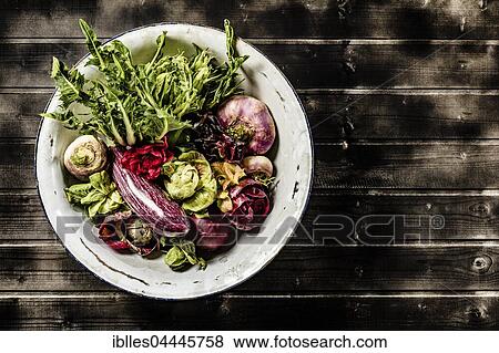 Vegetable bowl on dark wood table, South Tyrol, Italy, Europe View Large Photo Image Stock Photo - Vegetable bowl on dark wood table, South Tyrol, Italy, Europe. Fotosearch