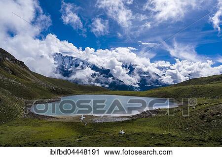 View across Ice Lake on Annapurna range, thunderstorm clouds, Braga, Manang District, Nepal, Asia View Large Photo Image Stock Image - View across Ice Lake on Annapurna range, thunderstorm clouds, Braga, Manang District, Nepal, Asia. Fotosearch