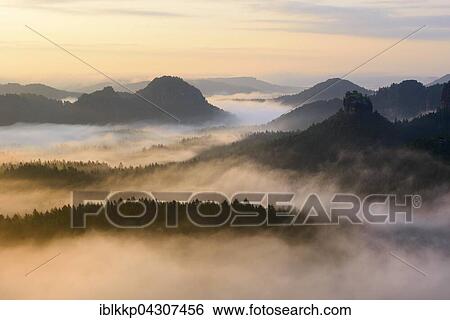 Stock Photograph - View from Kleiner Winterberg to Hinteres Raubschloss or Winterstein and Lorenzsteine, Elbe Sandstone Mountains, Saxon Switzerland, Saxony, Germany, Europe. Fotosearch