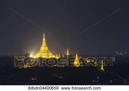 Stock Photo - View of Shwedagon pagoda at night, Yangon, Myanmar, Asia. Fotosearch