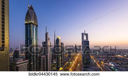 Stock Photography - View of sunset from Four Points by Sheraton, skyline and Sheikh Zayed Road, Downtown Dubai, United Arab Emirates, Asia. Fotosearch