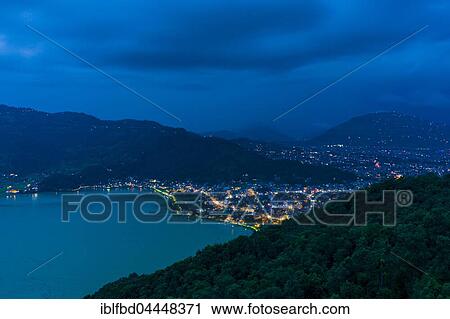 View on the illuminated city and the Phewa Lake at night, Pokhara, Kaski District, Nepal, Asia View Large Photo Image Stock Image - View on the illuminated city and the Phewa Lake at night, Pokhara, Kaski District, Nepal, Asia. Fotosearch
