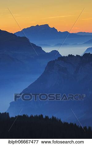 Stock Photo - View over the Muota valley with Pilatus, Schwyz, Switzerland, Europe. Fotosearch