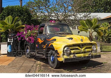 Vintage car decorated with flowers, old petrol station, Eleele, Kauai Island, Hawaii View Large Photo Image Picture - Vintage car decorated with flowers, old petrol station, Eleele, Kauai Island, Hawaii. Fotosearch