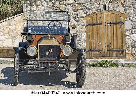 Stock Image - Vintage car, Ford T Runabout, built in 1913, 4 cylinders, cubic capacity 2700 cc, 2 forward gears, semi-automatic, 20 hp, 72 kmh. Fotosearch