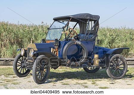 Stock Photography - Vintage car, Ford T Runabout, built in 1913, 4 cylinders, cubic capacity 2700 cc, 2 forward gears, semi-automatic, 20 hp, 72 kmh. Fotosearch