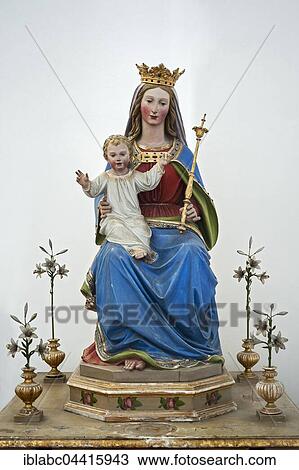 Virgin Mary holding baby Jesus with scepter and crown at the monastery Church of St. Peter and Paul in Weyarn, Upper Bavaria, Bavaria, Germany, Europe View Large Photo Image Stock Image - Virgin Mary holding baby Jesus with scepter and crown at the monastery Church of St. Peter and Paul in Weyarn, Upper Bavaria, Bavaria, Germany, Europe. Fotosearch
