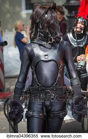Visitors in medieval armor costumes and horse mask, Berlin Pride Festival, Christopher Street Day, CSD, Berlin, Germany, Europe View Large Photo Image Stock Photography - Visitors in medieval armor costumes and horse mask, Berlin Pride Festival, Christopher Street Day, CSD, Berlin, Germany, Europe. Fotosearch