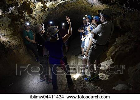 Visitors in the Cueva del Viento tunnel system, the longest lava cave in Europe, Tenerife, Canary Islands, Spain, Europe View Large Photo Image Picture - Visitors in the Cueva del Viento tunnel system, the longest lava cave in Europe, Tenerife, Canary Islands, Spain, Europe. Fotosearch