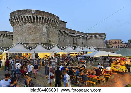 Stock Image - Visitors, Summer Jamboree, Rock'n'Roll Festival, Rocca Roveresca Castle, Senigallia, Province of Ancona, Marche, Italy, Europe. Fotosearch
