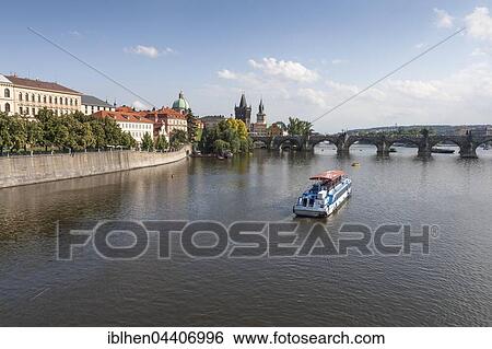 Vltava tour boat with Charles Bridge, Prague, Bohemia, Czech Republic, Europe View Large Photo Image Stock Photograph - Vltava tour boat with Charles Bridge, Prague, Bohemia, Czech Republic, Europe. Fotosearch
