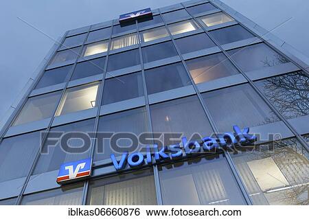 Stock Photograph - Volksbank Düsseldorf Neuss eG, illuminated logo at the Königsallee branch, Düsseldorf, North Rhine-Westphalia, Germany, Europe. Fotosearch