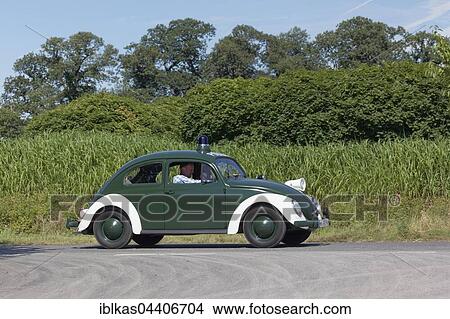 Picture - VW Beetle police car, 1967 model, vintage car, Schloss Dyck Classic Days 2016, Juchen, Niederrhein, North Rhine-Westphalia, Germany, Europe. Fotosearch