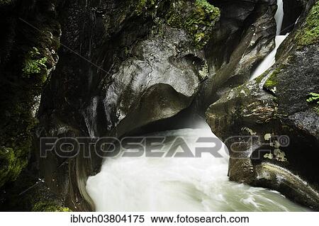 Water flowing through gorge, Wildgerlostal, Zillertal, Tyrol, Austria, Europe View Large Photo Image Stock Photography - Water flowing through gorge, Wildgerlostal, Zillertal, Tyrol, Austria, Europe. Fotosearch