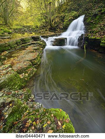 Waterfall in Schlichemklamm, autumn leaves on lime sintered terraces along the Schlichem River, Schlichemtal, Epfendorf, Baden-Württemberg, Germany, Europe View Large Photo Image Stock Image - Waterfall in Schlichemklamm, autumn leaves on lime sintered terraces along the Schlichem River, Schlichemtal, Epfendorf, Baden-Württemberg, Germany, Europe. Fotosearch