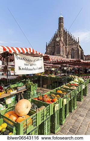 Weekly market on the main market in front of the Church of Our Lady, market stall, garlic country, pumpkins, vegetables, Nuremberg, Franconia, Bavaria, Germany, Europe View Large Photo Image Stock Photograph - Weekly market on the main market in front of the Church of Our Lady, market stall, garlic country, pumpkins, vegetables, Nuremberg, Franconia, Bavaria, Germany, Europe. Fotosearch