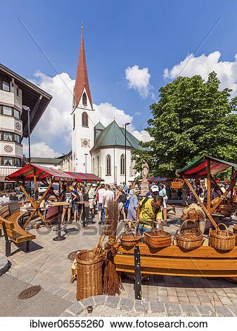 Weekly market on the village square in front of the parish church St. Oswald, pilgrimage church, Seefeld in Tyrol, Tyrol, Austria, Europe View Large Photo Image Stock Image - Weekly market on the village square in front of the parish church St. Oswald, pilgrimage church, Seefeld in Tyrol, Tyrol, Austria, Europe. Fotosearch