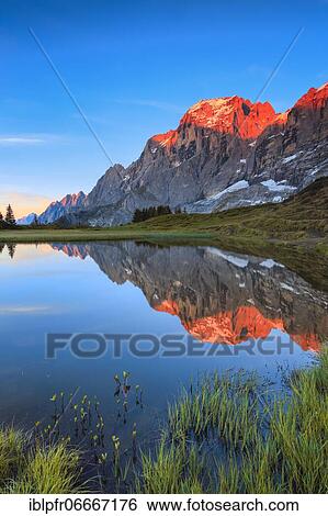 Stock Photograph - Wellhorn and Engelhörner with mountain lake, Bernese Oberland, Switzerland, Europe. Fotosearch