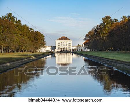 West side of Nymphenburg Palace, reflected in castle garden channel, autumn, Munich, Upper Bavaria, Bavaria, Germany, Europe View Large Photo Image Picture - West side of Nymphenburg Palace, reflected in castle garden channel, autumn, Munich, Upper Bavaria, Bavaria, Germany, Europe. Fotosearch