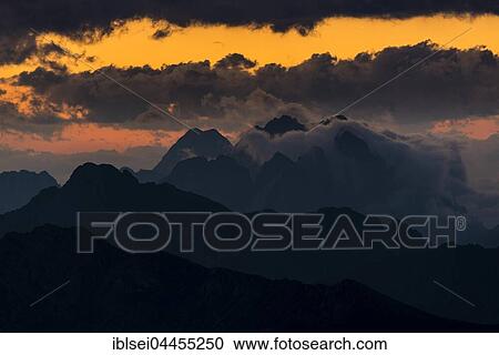 Wetterstein mountains, dark clouds at sunrise, Elemen, Lechtal, Bezirk Reutte, Tyrol, Austria, Europe View Large Photo Image Stock Image - Wetterstein mountains, dark clouds at sunrise, Elemen, Lechtal, Bezirk Reutte, Tyrol, Austria, Europe. Fotosearch