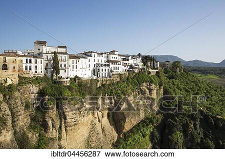 White Town high above the river gorge El Tajo, Ronda, Malaga province, Andalusia, Spain, Europe View Large Photo Image Stock Photo - White Town high above the river gorge El Tajo, Ronda, Malaga province, Andalusia, Spain, Europe. Fotosearch