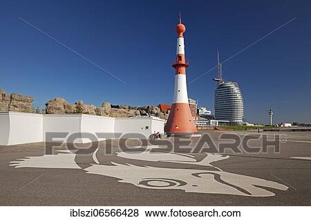 Willy-Brandt-Platz with lighthouse front light and Atlantic Hotel Sail City, Bremerhaven, Federal State of Bremen, Germany, Europe View Large Photo Image Stock Photo - Willy-Brandt-Platz with lighthouse front light and Atlantic Hotel Sail City, Bremerhaven, Federal State of Bremen, Germany, Europe. Fotosearch