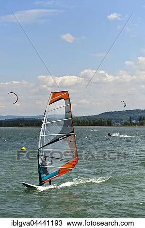 Windsurfer on Lake Biel, La Neuveville, Bern, Switzerland, Europe View Large Photo Image Stock Image - Windsurfer on Lake Biel, La Neuveville, Bern, Switzerland, Europe. Fotosearch