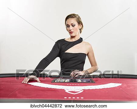 Woman uncovers cards, chips, gaming, Blackjack View Large Photo Image Stock Image - Woman uncovers cards, chips, gaming, Blackjack. Fotosearch