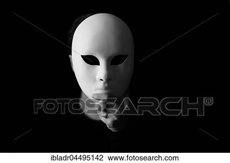 Woman with mask in his hand in front of face View Large Photo Image Stock Image - Woman with mask in his hand in front of face. Fotosearch