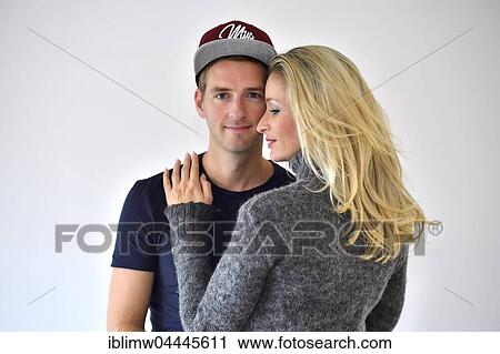 Stock Image - Young couple, lovers hugging. Fotosearch
