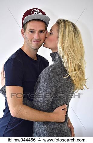 Young couple, lovers kissing and hugging View Large Photo Image Picture - Young couple, lovers kissing and hugging. Fotosearch