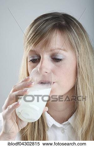 Young woman drinking medicine View Large Photo Image Stock Photography - Young woman drinking medicine. Fotosearch