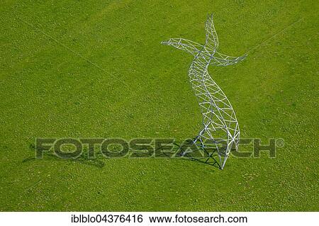 Zauberlehrling Sculpture, 2013 installation, dancing electric pylon, Emscher art, Ines Idee art group, Oberhausen, Ruhr district, North Rhine-Westphalia, Germany, Europe View Large Photo Image Stock Photograph - Zauberlehrling Sculpture, 2013 installation, dancing electric pylon, Emscher art, Ines Idee art group, Oberhausen, Ruhr district, North Rhine-Westphalia, Germany, Europe. Fotosearch