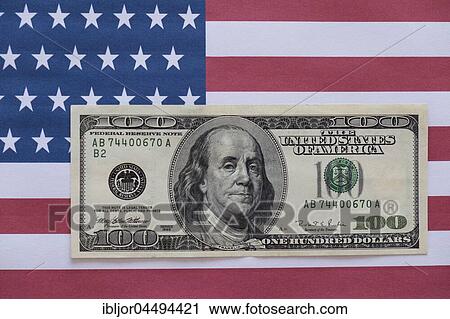 100 US dollar bill on US flag View Large Photo Image Stock Image - 100 US dollar bill on US flag. Fotosearch
