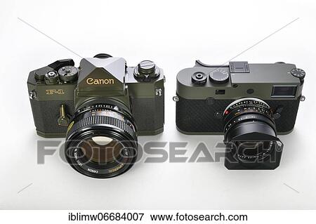 50 years difference: limited edition special edition Canon F-1 ODF-1 in military olive drab finish from 1971, and limited edition Leica M10-P Reporter with Kevlar coating introduced in 2021, Germany, Europe View Large Photo Image Stock Photo - 50 years difference: limited edition special edition Canon F-1 ODF-1 in military olive drab finish from 1971, and limited edition Leica M10-P Reporter with Kevlar coating introduced in 2021, Germany, Europe. Fotosearch