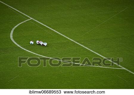 Stock Image - Adidas Derbystar match balls lie on grass, Mercedes-Benz Arena, Stuttgart, Baden-Württemberg, Germany, Europe. Fotosearch
