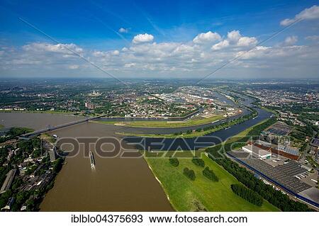 Aerial view, Cargo ship on the Rhine, brown flood mixes with the clean water of the Ruhr, Ruhr estuary, Duisburg, Ruhr district, North Rhine-Westphalia, Germany, Europe View Large Photo Image Stock Image - Aerial view, Cargo ship on the Rhine, brown flood mixes with the clean water of the Ruhr, Ruhr estuary, Duisburg, Ruhr district, North Rhine-Westphalia, Germany, Europe. Fotosearch