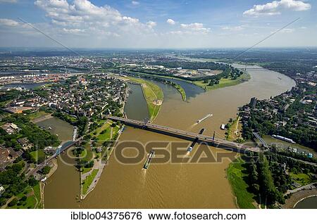Aerial view, Cargo ships on the Rhine, brown flood mixes with the clean water of the Ruhr, Ruhr estuary, Duisburg, Ruhr district, North Rhine-Westphalia, Germany, Europe View Large Photo Image Stock Photograph - Aerial view, Cargo ships on the Rhine, brown flood mixes with the clean water of the Ruhr, Ruhr estuary, Duisburg, Ruhr district, North Rhine-Westphalia, Germany, Europe. Fotosearch
