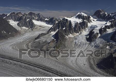 Aerial view, Kahiltna Glacier with tributary glaciers and mountain ranges of the Alaska Range, near Denali Massif, Denali National Park, Alaska, USA, North America View Large Photo Image Stock Image - Aerial view, Kahiltna Glacier with tributary glaciers and mountain ranges of the Alaska Range, near Denali Massif, Denali National Park, Alaska, USA, North America. Fotosearch