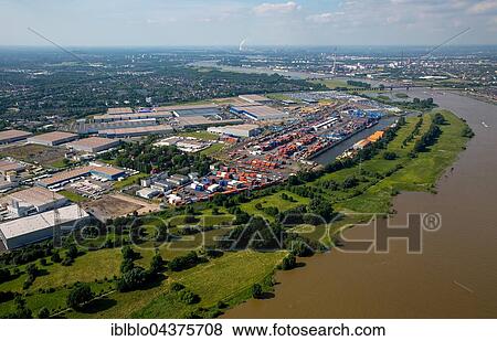 Stock Photo - Aerial view, Logport in Rheinhausen am Rhein with Container Terminal and Rhine flood, Duisburg, Ruhr district, North Rhine-Westphalia, Germany, Europe. Fotosearch